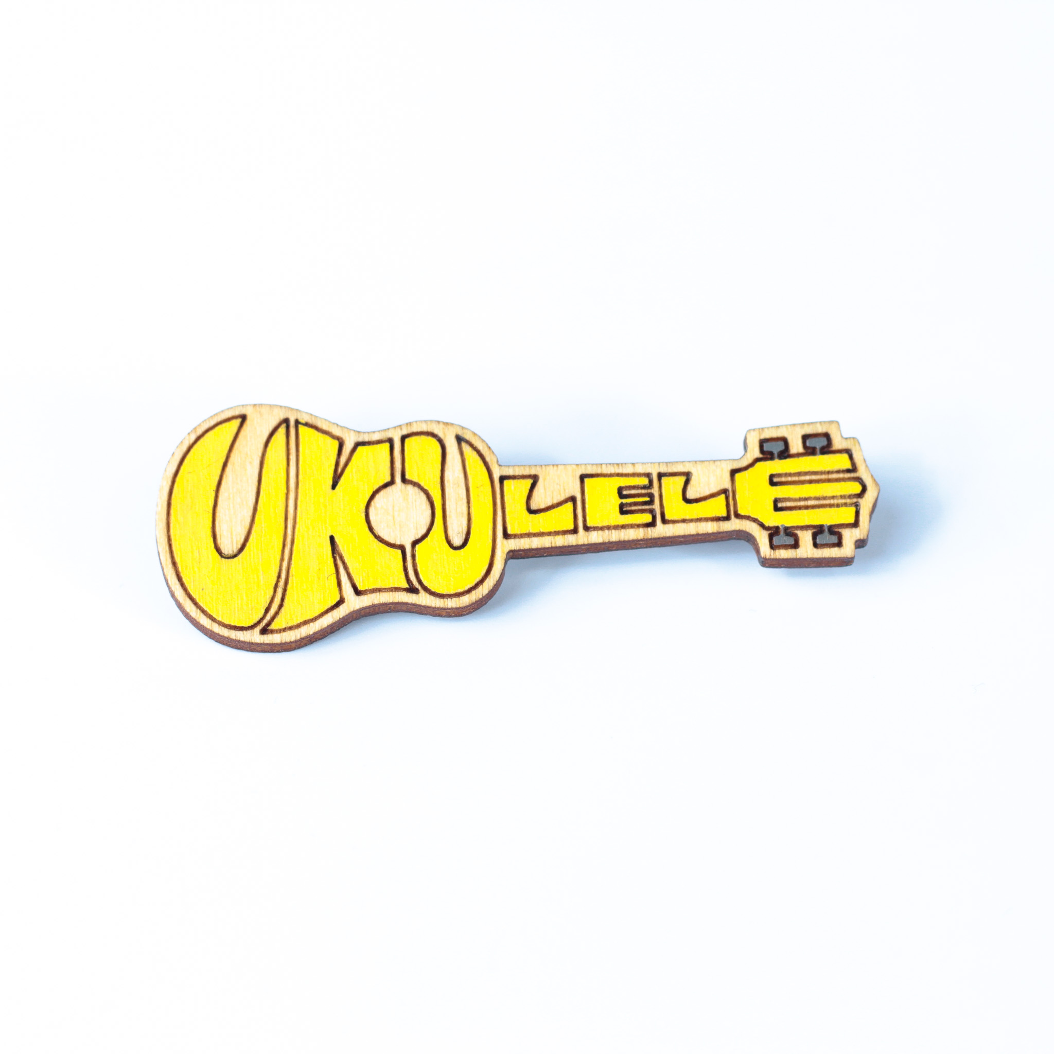 Значок с надписью Ukulele желтый